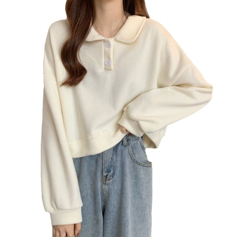 Kvinnes kortermet sweatshirt med moteriktig krage og dekorative knapper