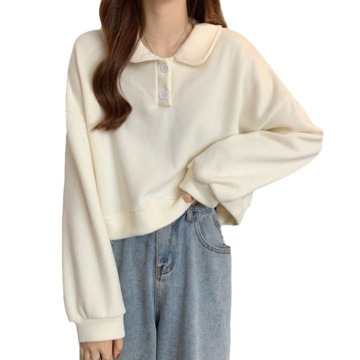Kvinnes kortermet sweatshirt med moteriktig krage og dekorative knapper