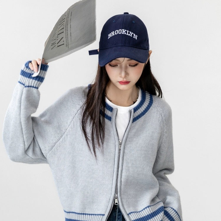Damer moteriktig strikket cardigan med glidelås og sporty stripe mønster Skjora