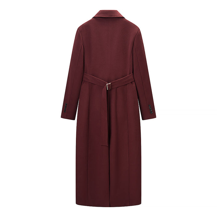Kvinne Elegant trenchcoat i minimalistisk design med praktiske lommer Skjora