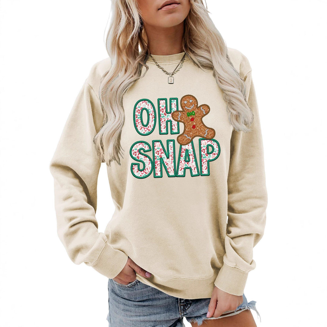 Dame sweatshirt med morsomt pepperkakemannmotiv og glitrende bokstaver Skjora