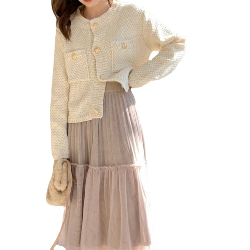 Dame cardigan med dekorative knapper og teksturert design Skjora