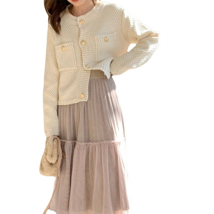 Dame cardigan med dekorative knapper og teksturert design Skjora