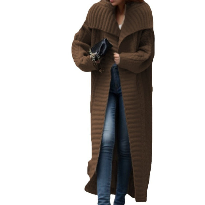 Women's chunky knitted coat with wide-cut sleeves and modern design Skjora