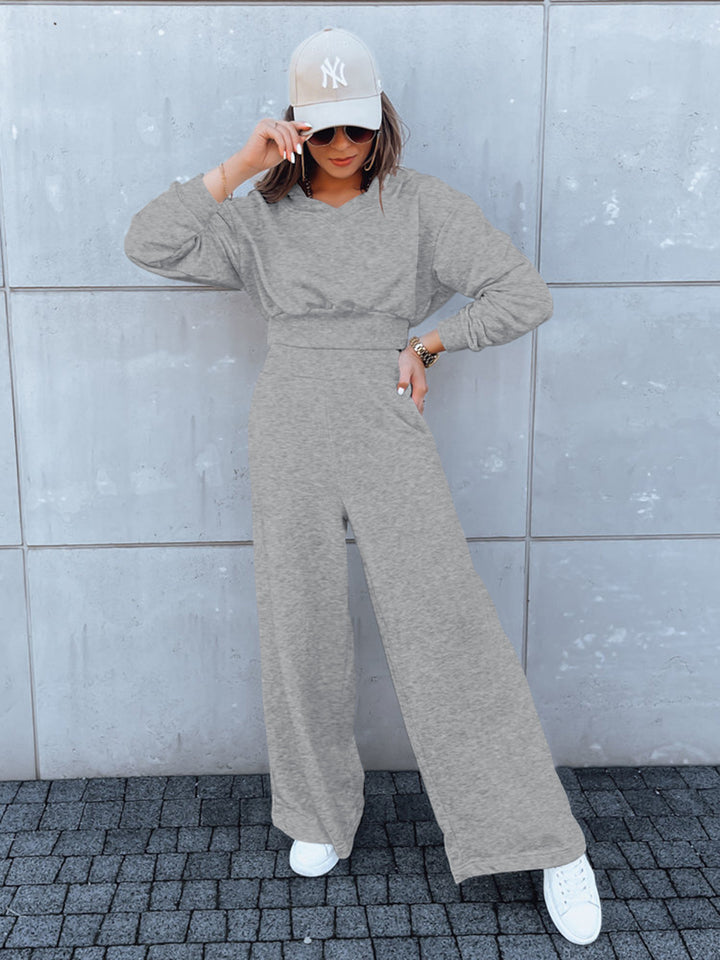Kvinne casual jumpsuit med vide ben og praktisk hette Skjora