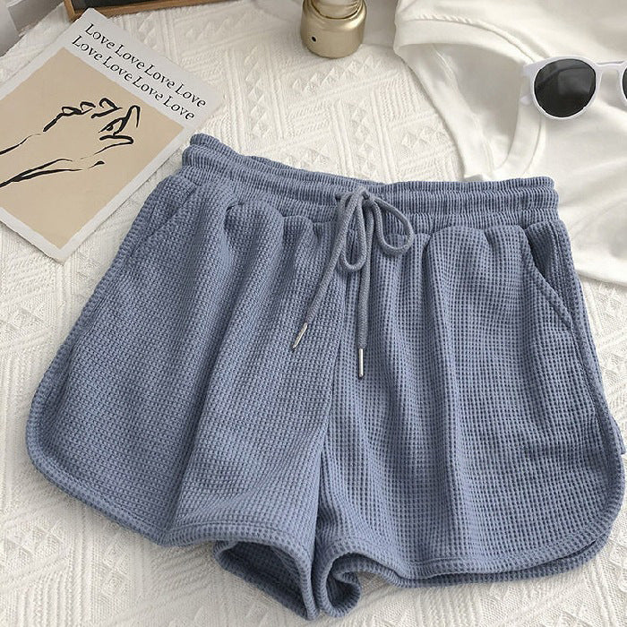 Kvinnelige casual shorts med vaffelstruktur og justerbar snorlås og elastisk midjebånd