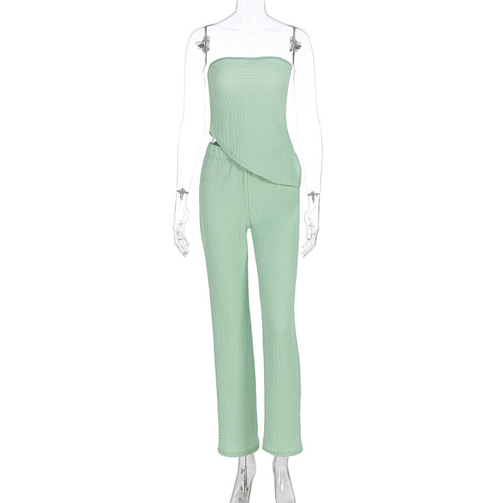 Dame elegant jumpsuit med off-shoulder design og asymmetrisk hem Skjora