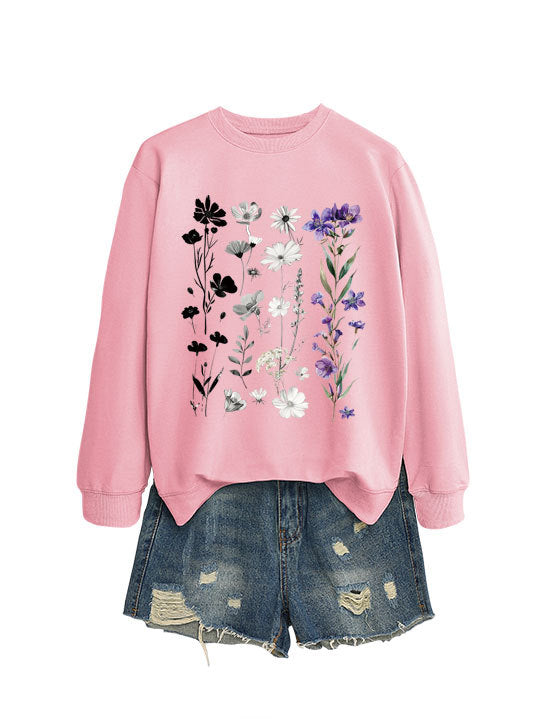 Dame sweatshirt med blomster grafisk design og myk innvendig fôr Skjora