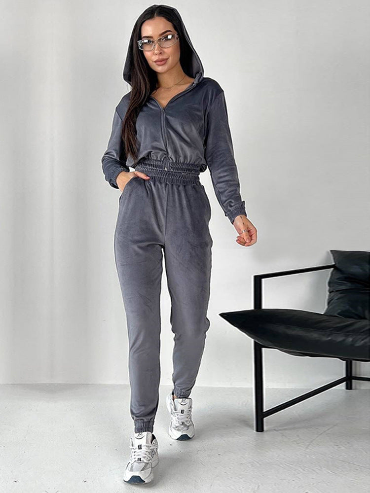 Kvinner's Velour Joggedrakt med Fasjonabel Kuttet Design og Praktisk Glidelås Skjora