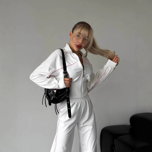 Kvinnelig stilfull fleece joggedress med kort glidelås og elastisk midjebånd Skjora