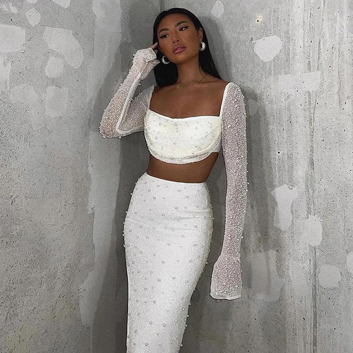 Dame Elegant Crop-Topp med lange, transparente ermer og glitrende akenter Skjora