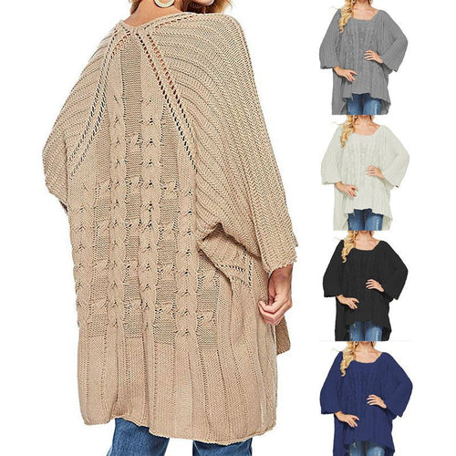 Kvinnes chunky strikket poncho med trendy kabelforløpning og brede ermer Skjora
