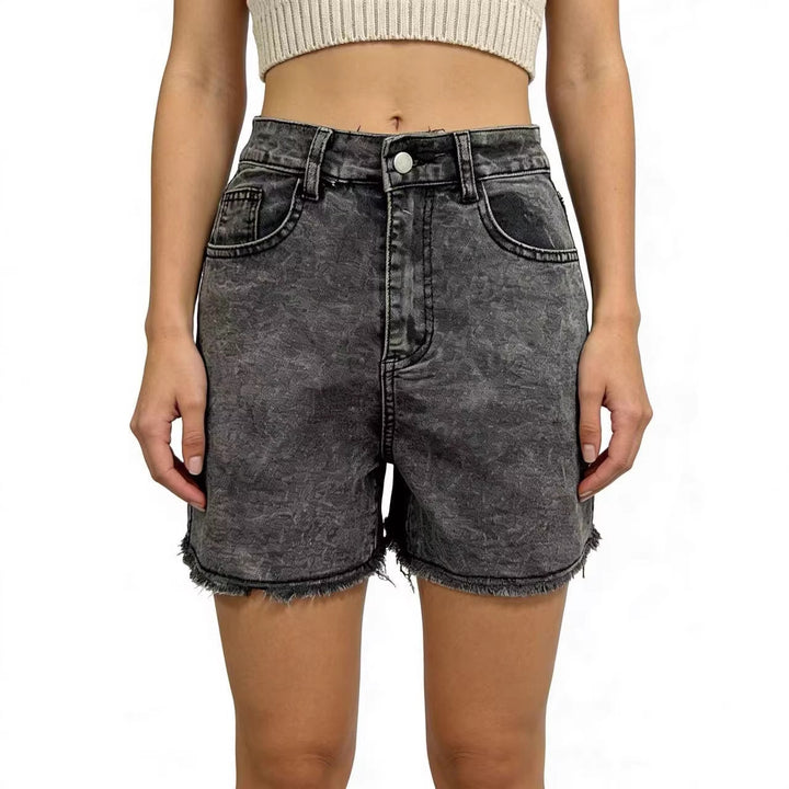 Dame modiske denim-shorts i avslappet snitt med frynsete kant Skjora