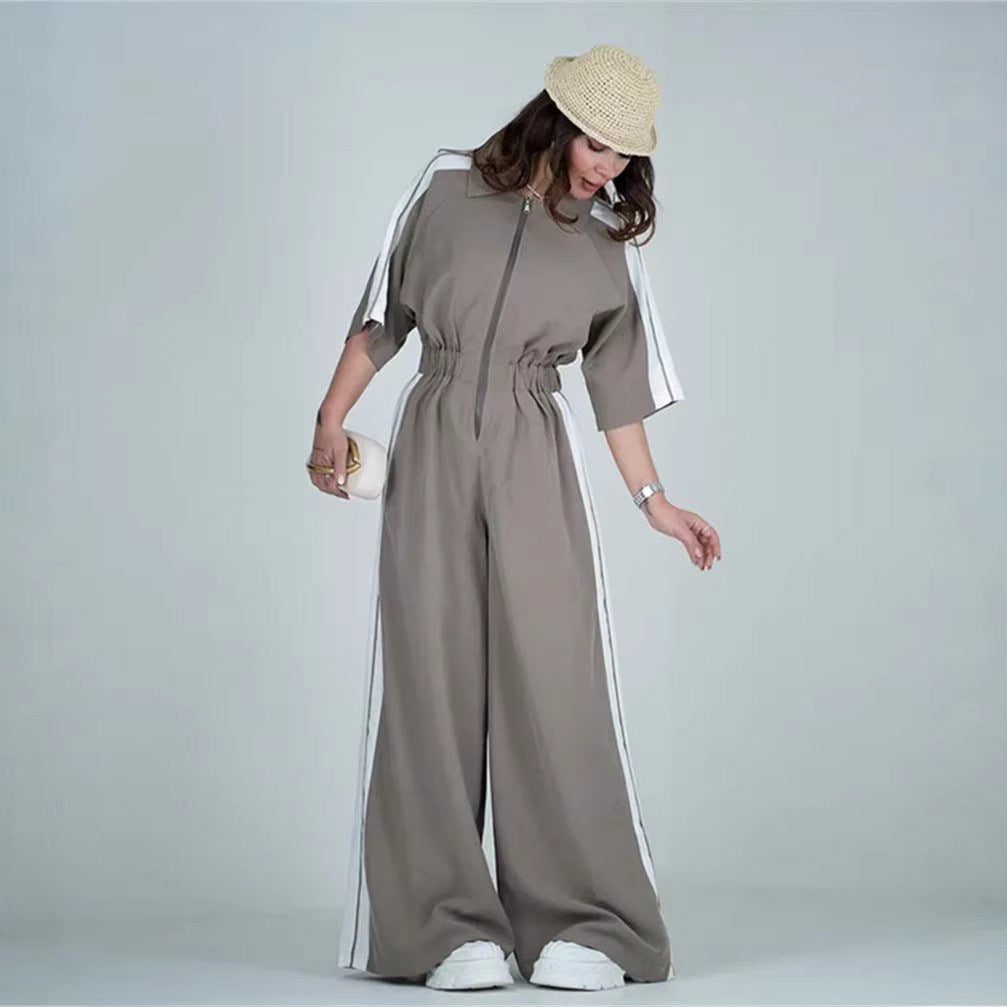Kvinnenes lange jumpsuit med belte og kontraststriper