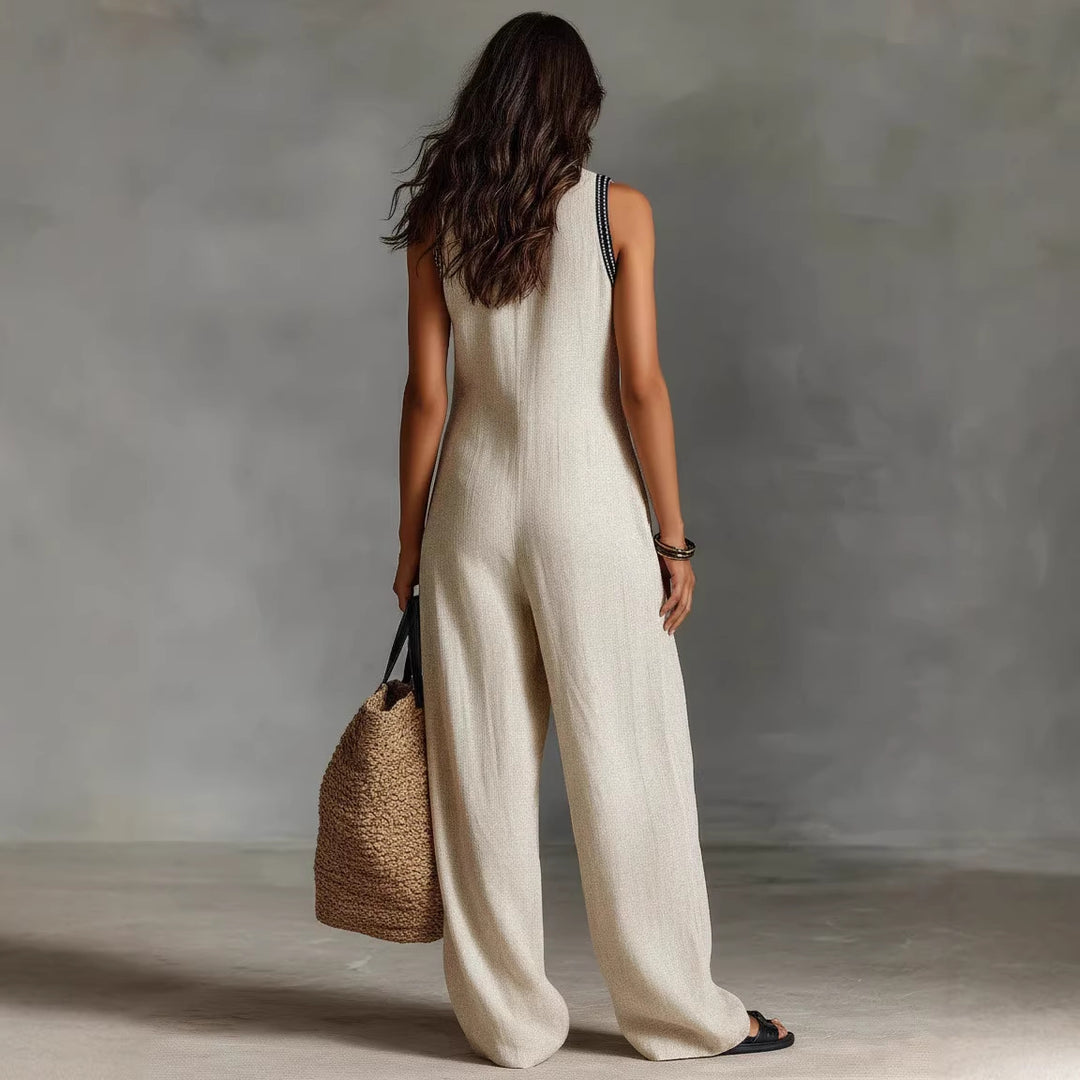 Dame luftig jumpsuit med elegant V-hals og brodert krage Skjora