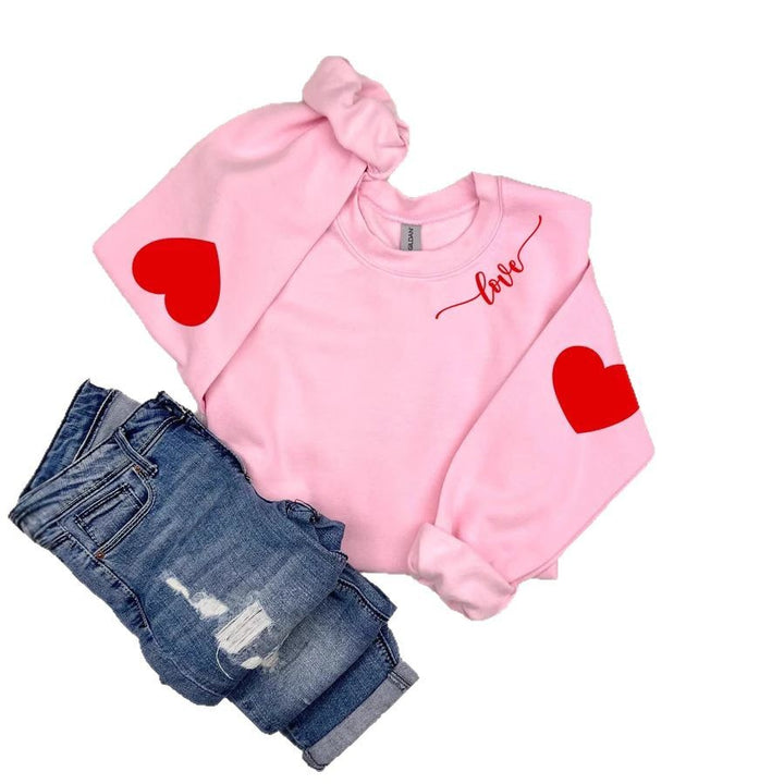 Dame sweatshirt med hjerte design og avslappet passform Skjora