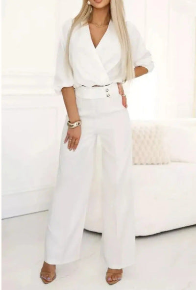 Kvinne elegant jumpsuit med omslagstopp og høyt liv ben Skjora