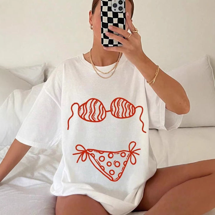 Damer oversized T-skjorte med kreativt bademotivsdesign og avslappet snitt Skjora