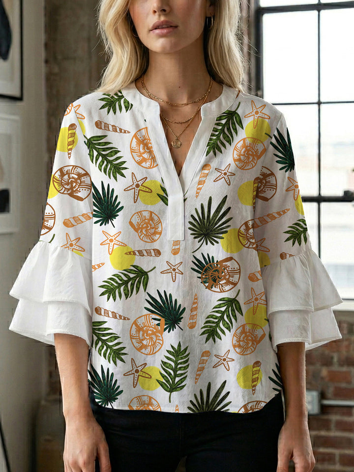Dame bluse med voluminøse rysjermer og moderne motiv Skjora