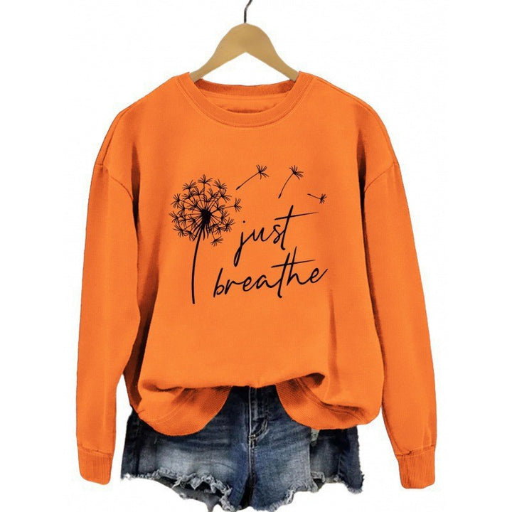 Dame sweatshirt med inspirerende løvetannmotiv Skjora
