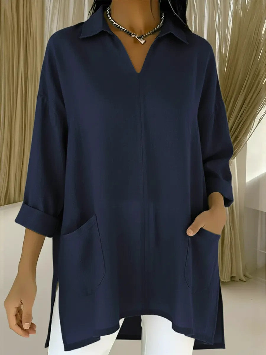 Dame langermet bluse med elegant V-hals og praktiske lommer Skjora