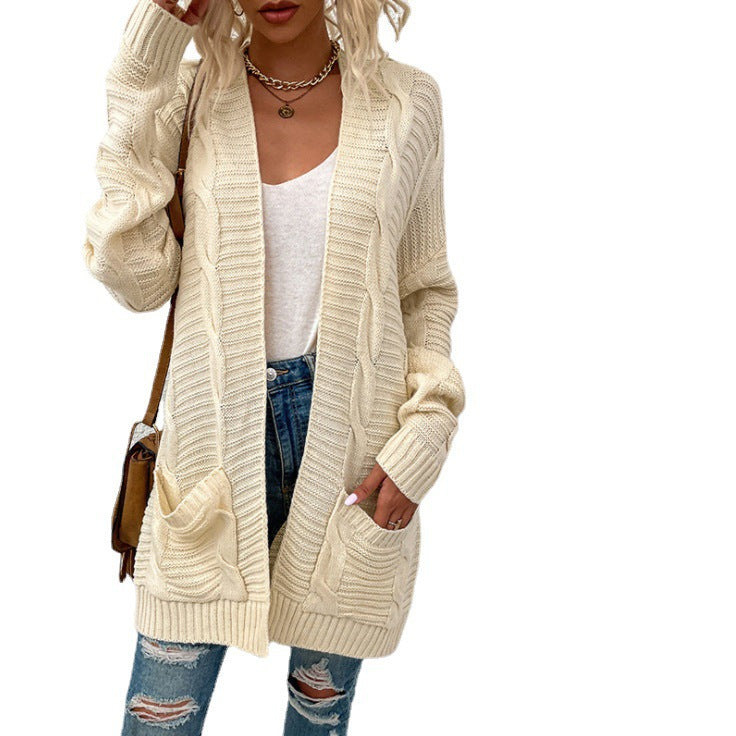 Kvinne chunky strikk cardigan med lommer og åpen frontdesign Skjora