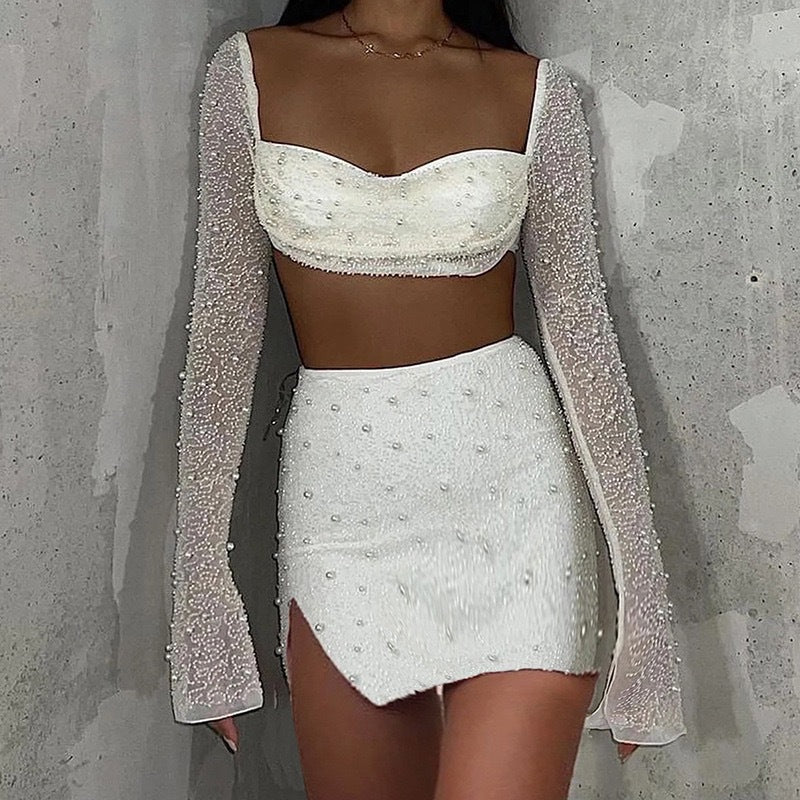 Dame Elegant Crop-Topp med lange, transparente ermer og glitrende akenter Skjora