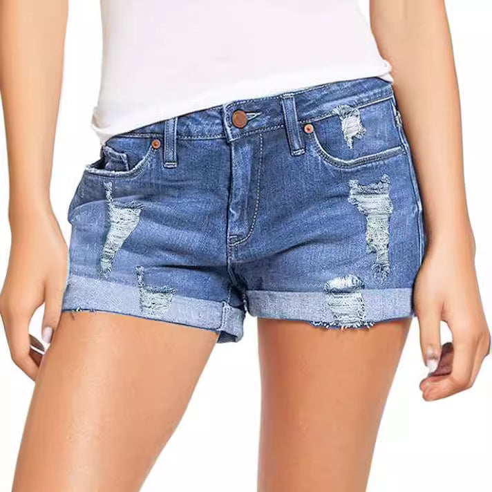 Dame trendy ødelagte denimshorts med oppbrettede kanter Skjora
