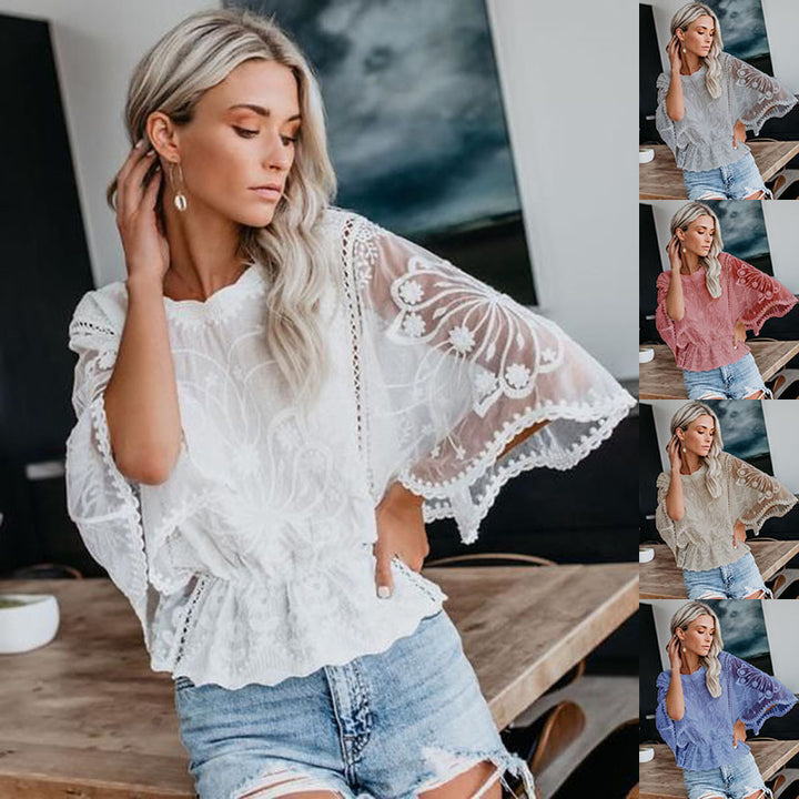 Kvinnes elegant bluse i blonde med voluminøse ermer Skjora