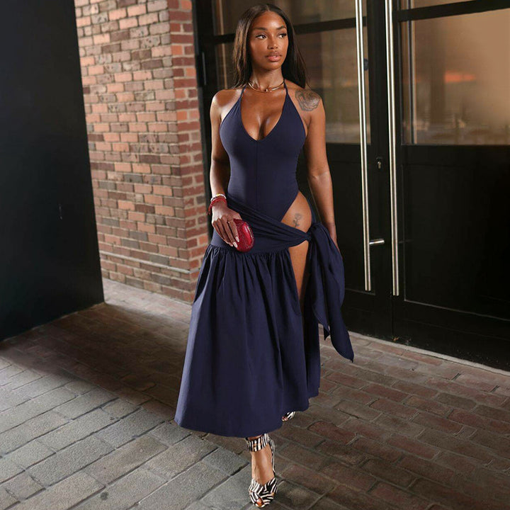 Dame Maxi-kjole med elegant omslagsdesign og sidedelt slit Skjora