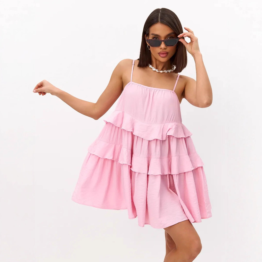 Damer Lekent puffkjole laget av lett bomullsmateriale med volangdetaljer Skjora