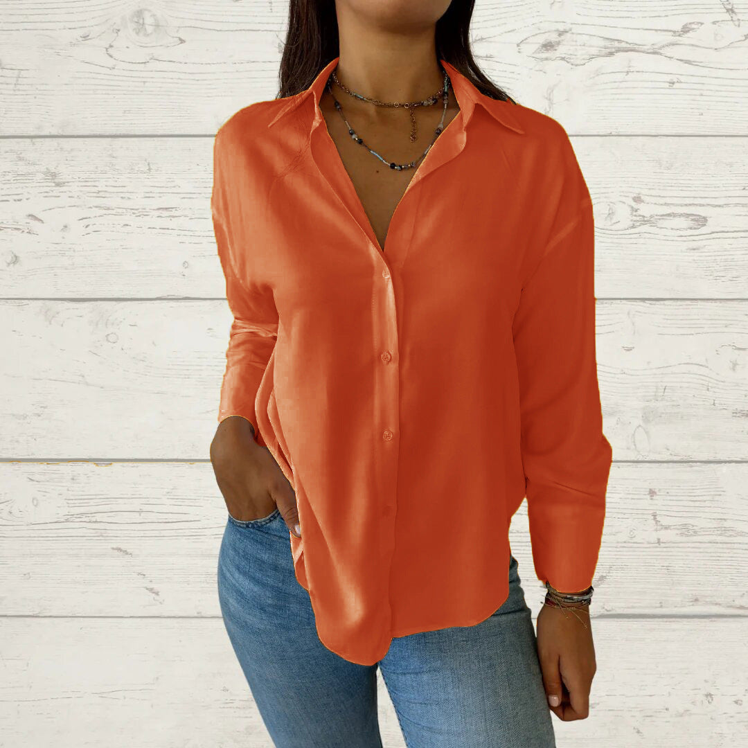 Dame elegant langermet bluse med fint stoff og feminine detaljer Skjora
