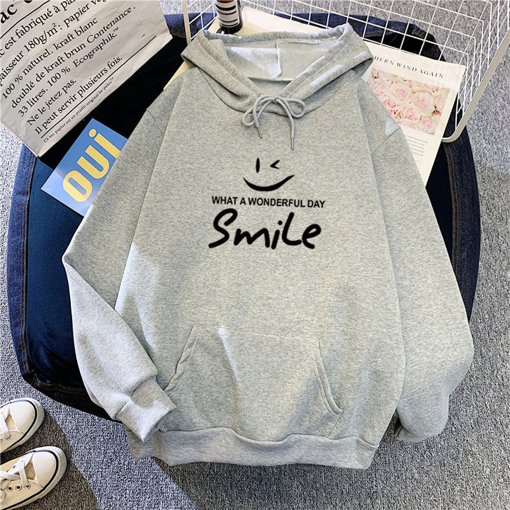 Dame hettegenser med gledelig smile-print Skjora