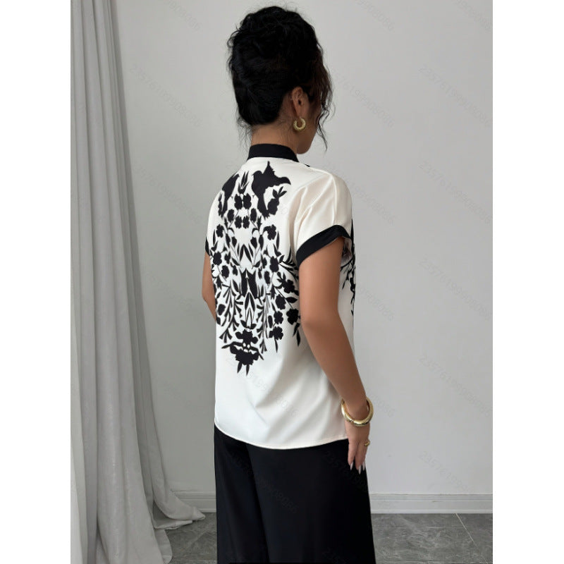 Damebluse med blomsterdetaljer og elegant snitt Skjora