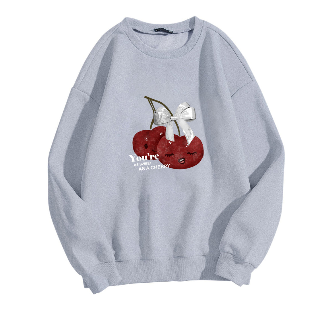 Kvinne komfortabel sweatshirt med fruktig kirsebærmotiv Skjora