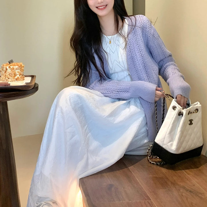 Dame cardigan med delikat mønster og knappdetaljer Skjora