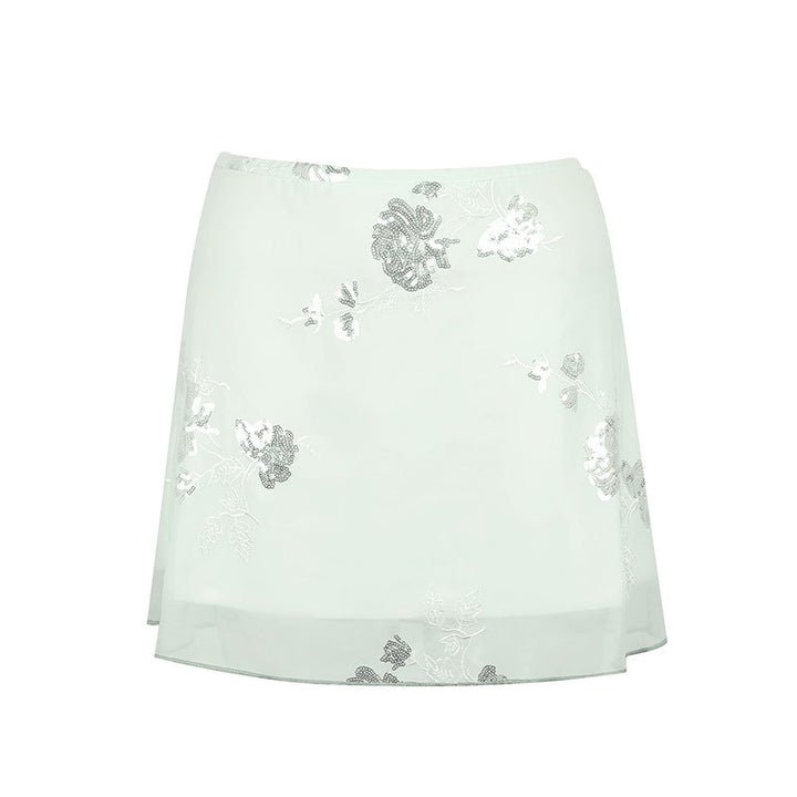 Dame gjennomsiktig skjørt med floralt design og glitrende detaljer Skjora