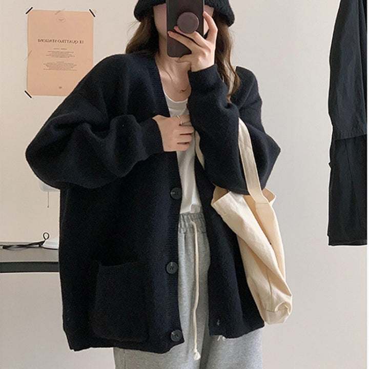 Kvinne Oversized Cardigan med Praktiske Lommer og V-Hals Skjora