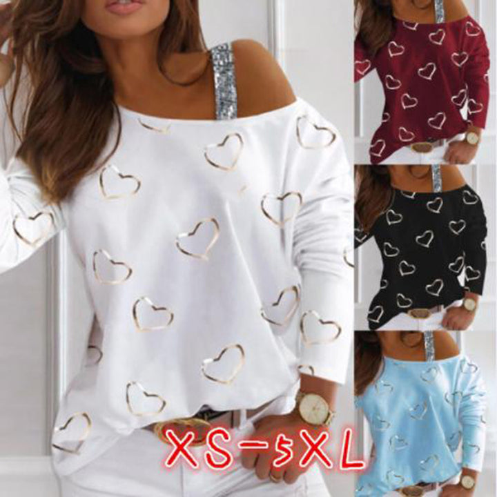 Kvinnelig motesweater med hjerteformet design og glitrende aksenter Skjora