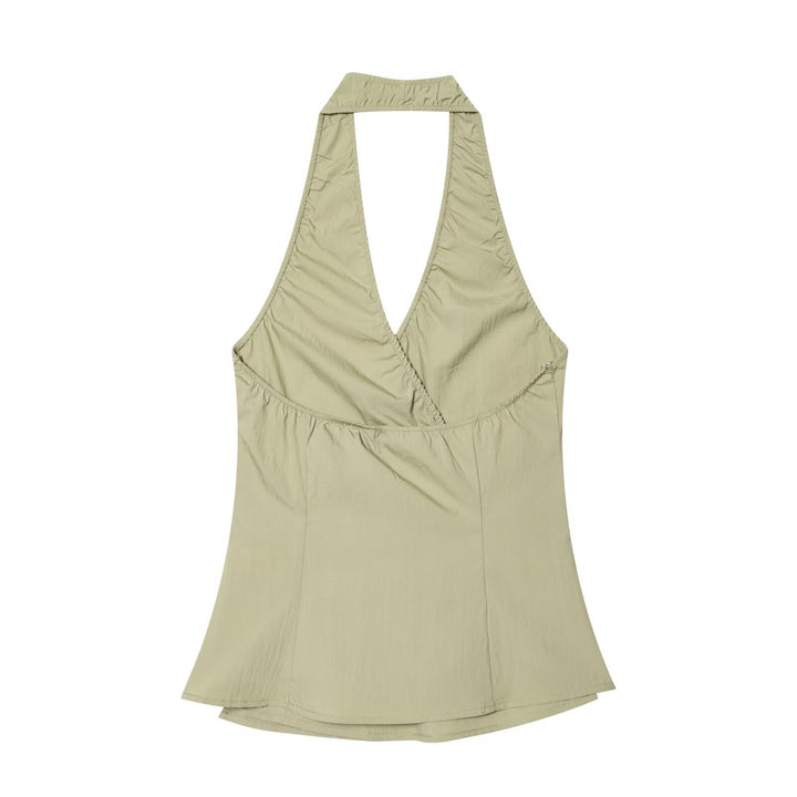 Dame Halterneck Top med elegant knute-detalj og flytende snitt Skjora