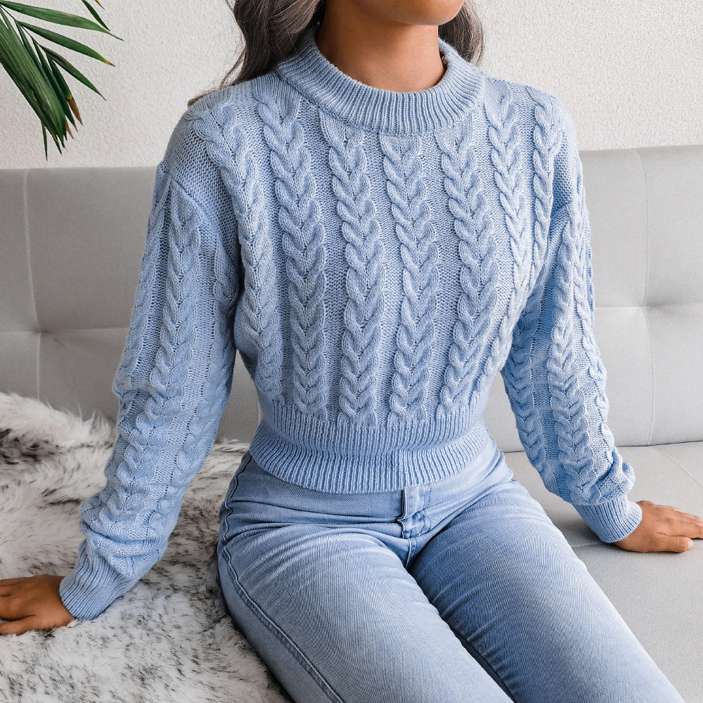Kvinnens chunky strikkegenser med kabeldesign og ledig passform Skjora