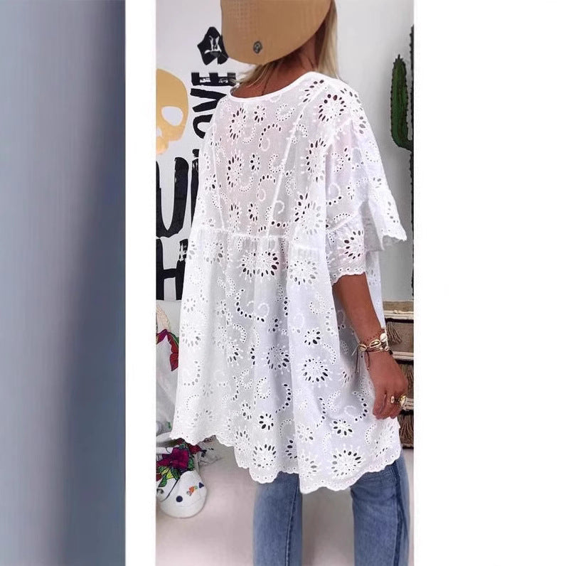 Damebluse med blomsterbroderier og vide ermer Skjora