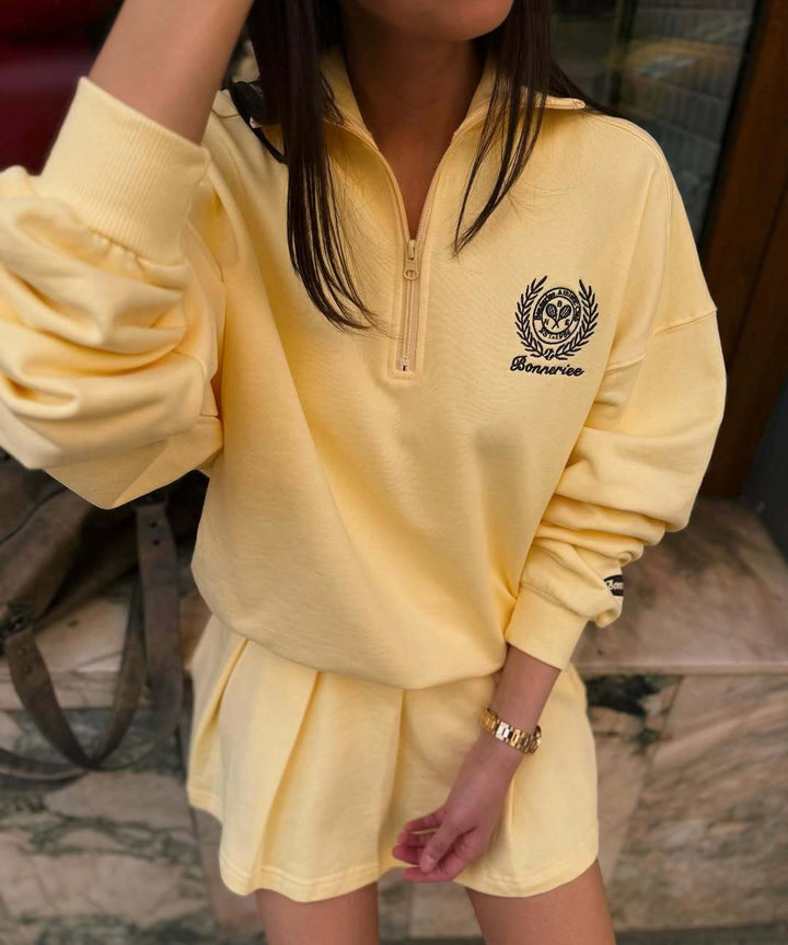 Dame sporty zip genser med avslappet snitt og broderi Skjora