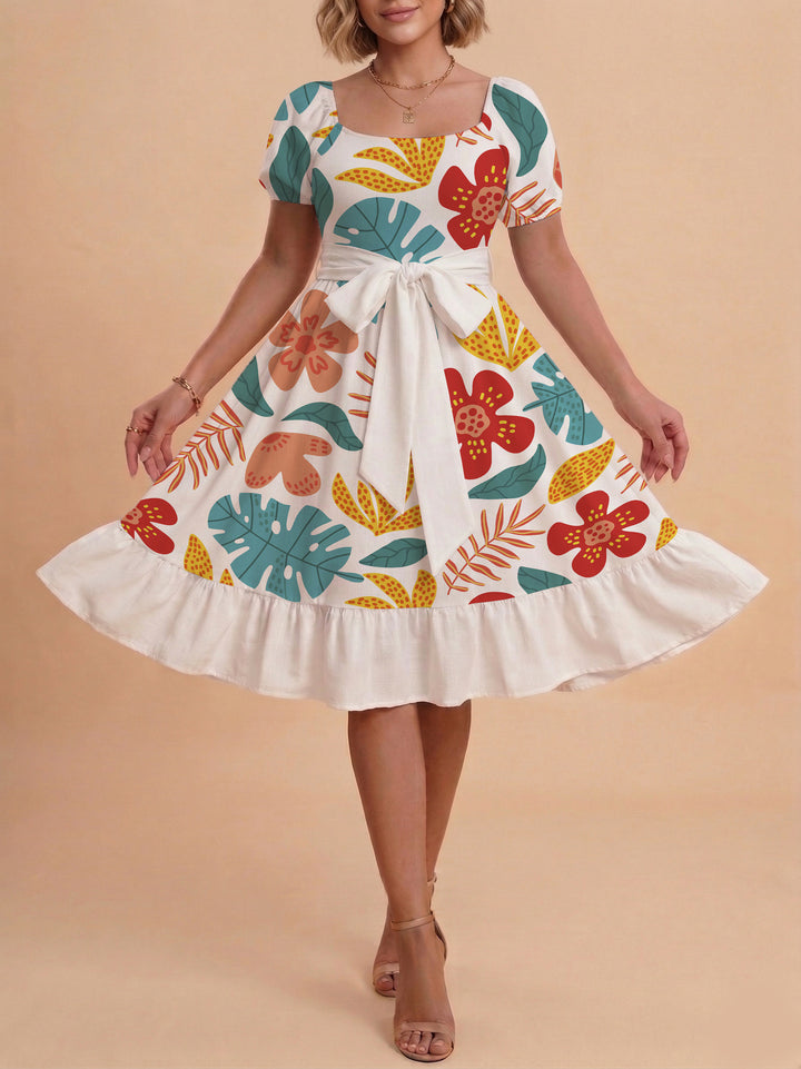 Damen Sommerliches Blumenkleid mit taillierbarem Gürtel und voluminösen Ärmeln Skjora