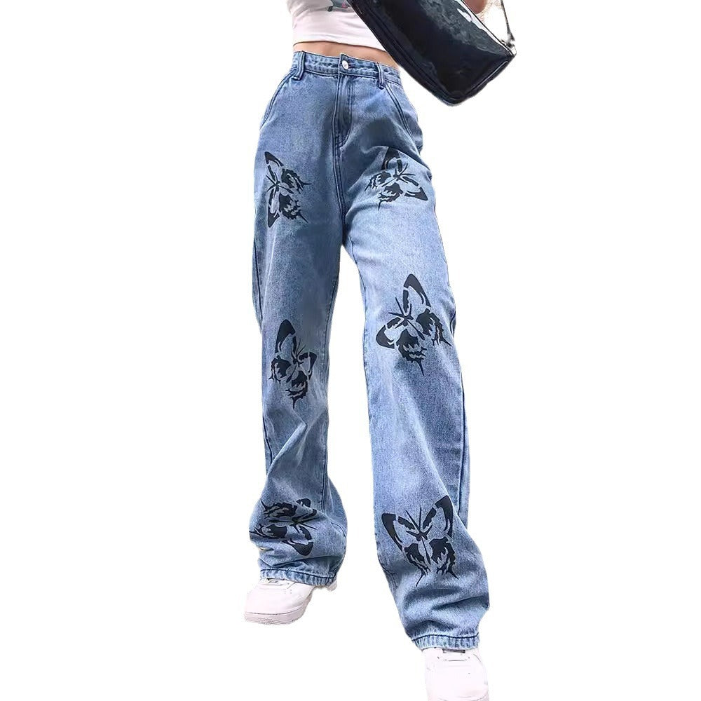 Dame vide jeans med iøynefallende sommerfugltrykk Skjora