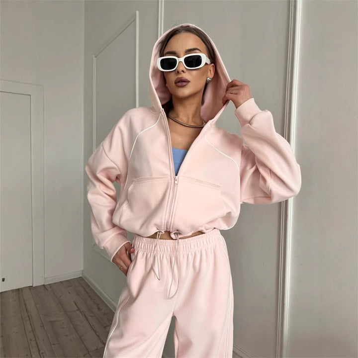 Kvinnenes sporty cropped jakke og joggebukser med kontrasterende sømmer Skjora
