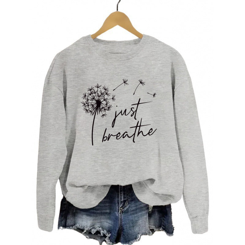 Dame sweatshirt med inspirerende løvetannmotiv Skjora