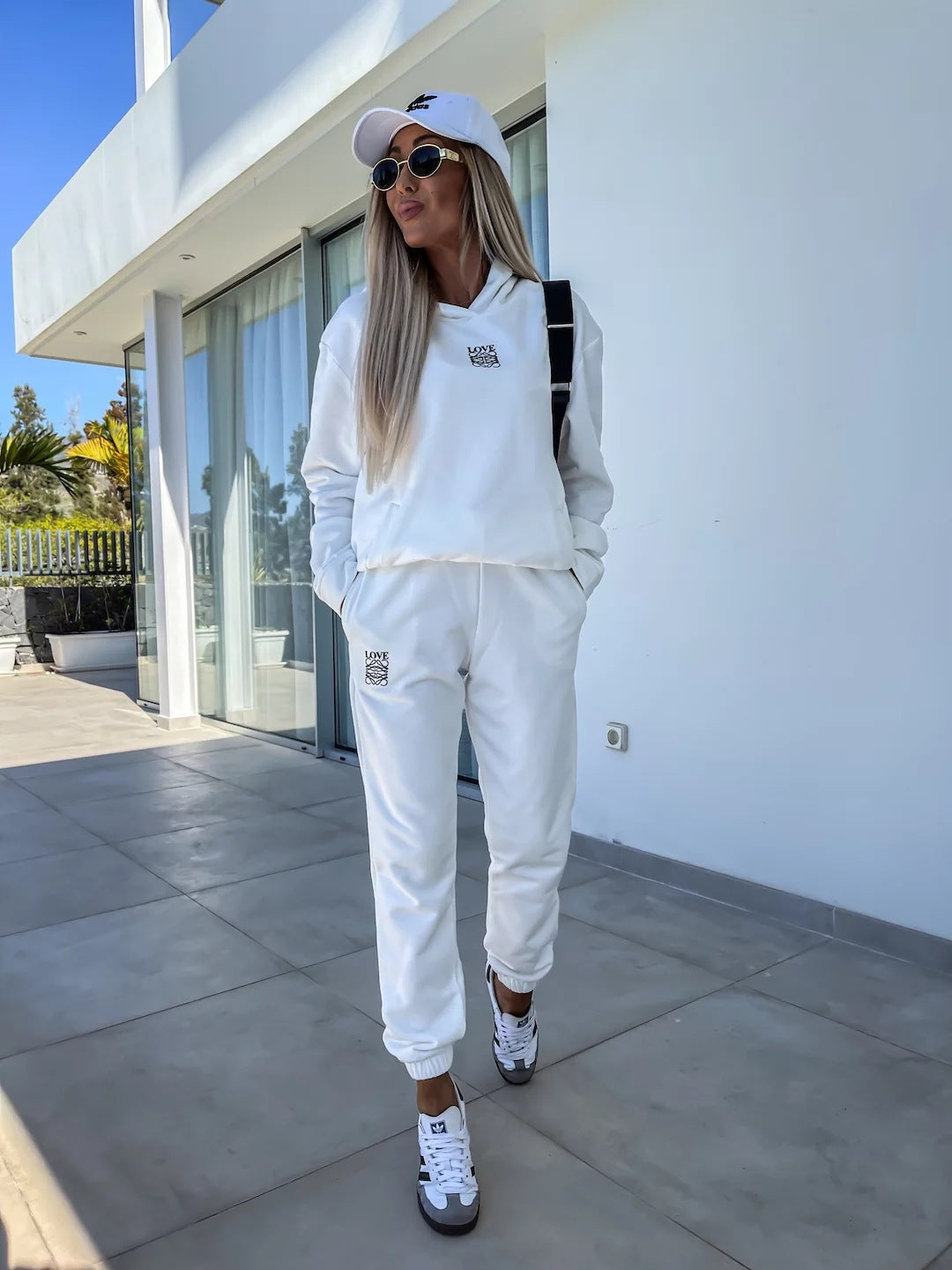 Dame sporty loungewear-set med hette og elastiske mansjetter Skjora