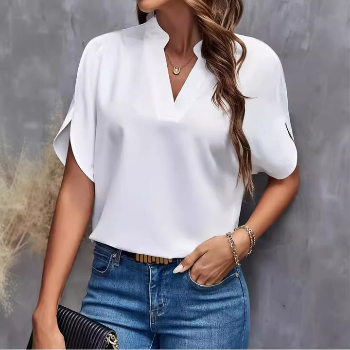 Dame elegant bluse med halvlange ermer og moderne ståkrage Skjora