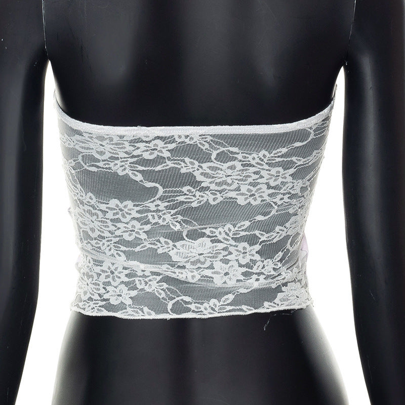 Dame Bandeau-top med blomsterdetaljer og spiss avslutning Skjora